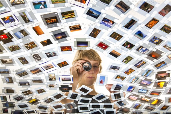 Young woman sorting mounted slides