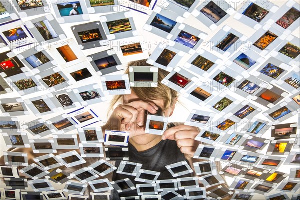 Young woman sorting mounted slides