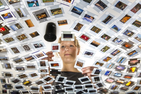 Young woman sorting mounted slides