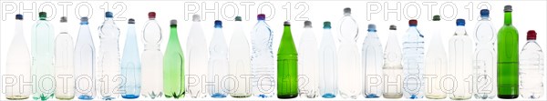 Different varieties of mineral water in bottles made of glass and plastic or PET