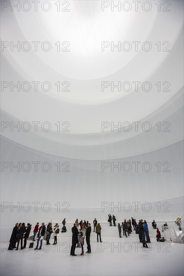 Visitors within an installation by Christo