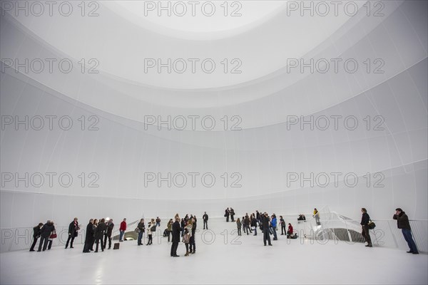 Visitors within an installation by Christo