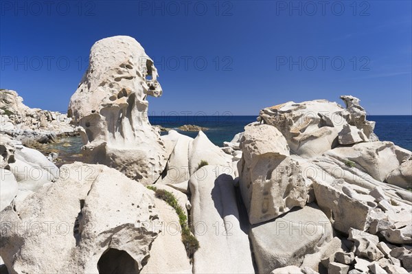 Eroded granite rocks on the beach of Punta Molentis