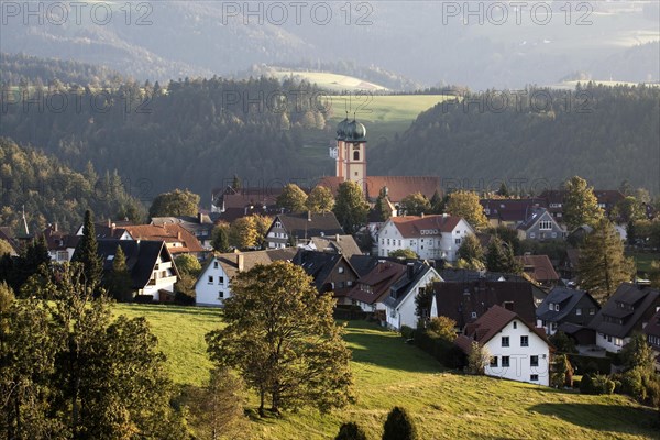View of the village of St Maergen with the monastery church in the evening light