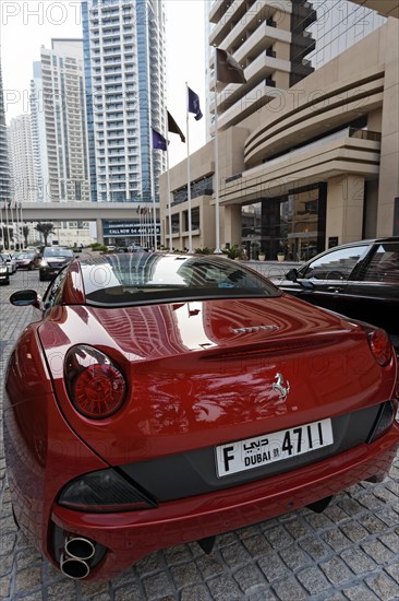 Ferrari parked in front of the luxury hotel Grosvenor House