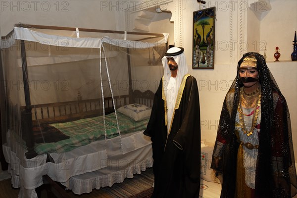 Arab couple wearing traditional clothing