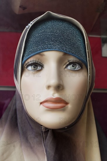 Mannequin wearing a fashionable Arab headscarf