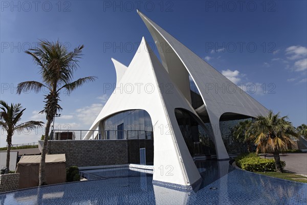 White building in the form of sails