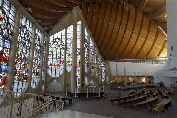 Futuristic church with historic stained glass windows