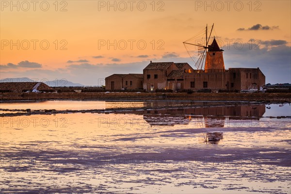 Sunset at the old saltworks in the Laguna dello Stagnone near Trapani