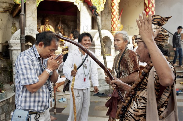 Animist hermit say healing prayers and tell fortunes at Doi Suthp Buddhist temple in Chiang Mai