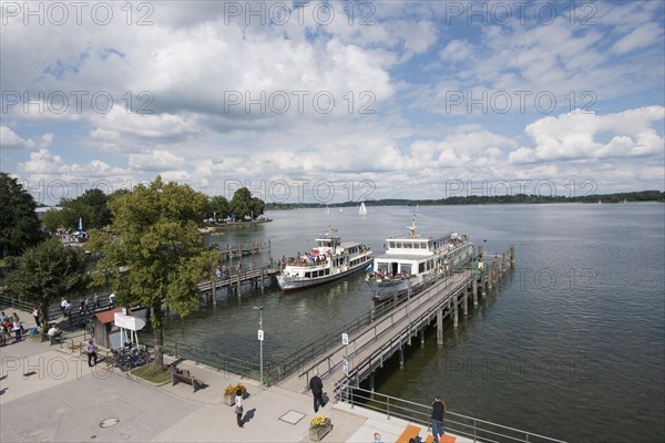 Landing stage with a steamboat on lake Chiemsee