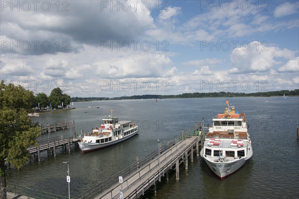 A steamboat at a landing stage on lake Chiemsee