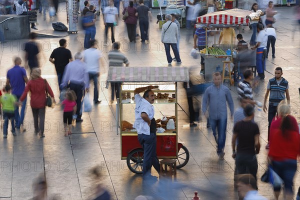 Street vendors with wagons selling pastries