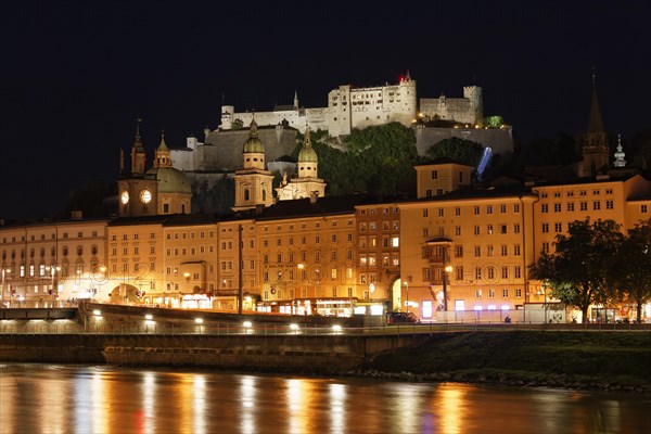 View over the Salzach river with the tower of the Town Hall