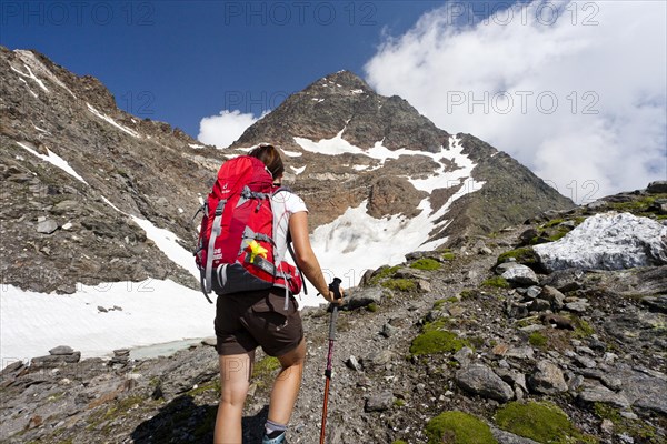 Hiker climbing Hochwilde mountain