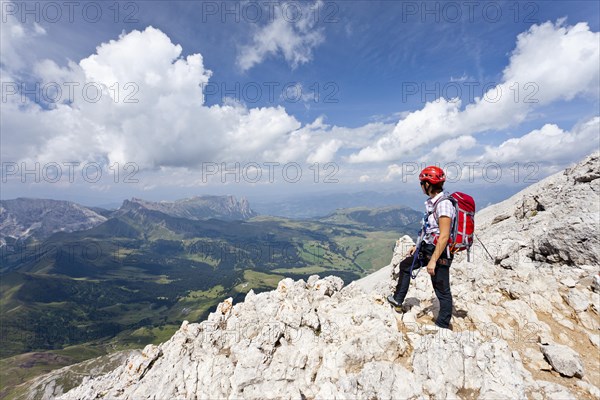 Hikers walking on the summit ridge