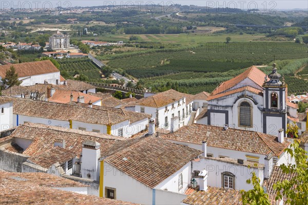 Cityscape of Obidos and Senhor Jesus da Pedra Sanctuary Church