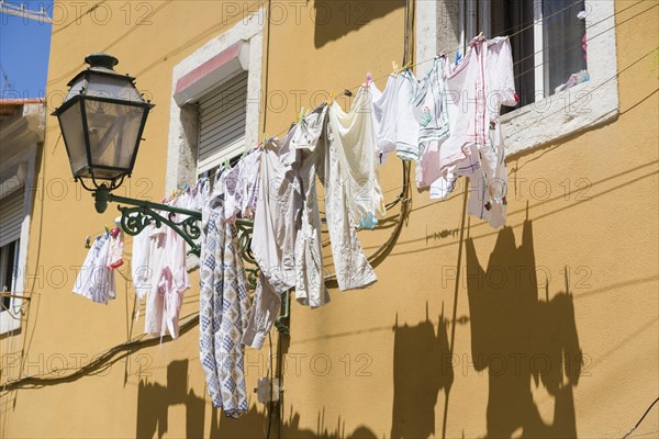 Washing line in front of house