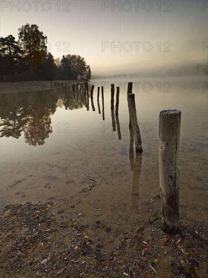 Early morning mood at Kuhsee lake with a bathing bay