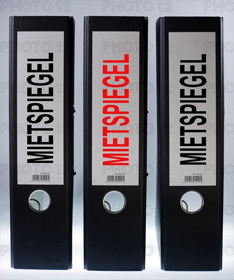 Three file folders labeled 'Mietspiegel'