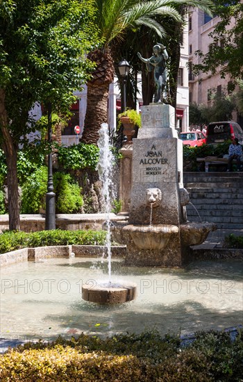 Monument of Joan Alcover at the former entrance to the Almudaina Palace