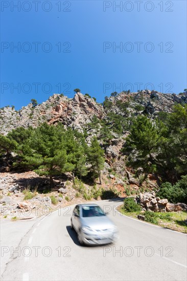 Car travelling on a mountain road near Estellencs