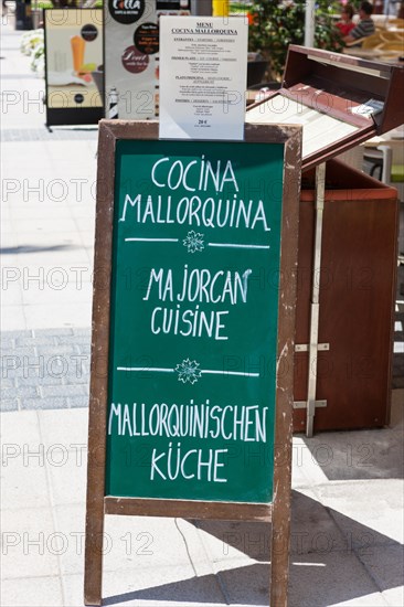 Sign of a restaurant serving typical Majorcan cuisine