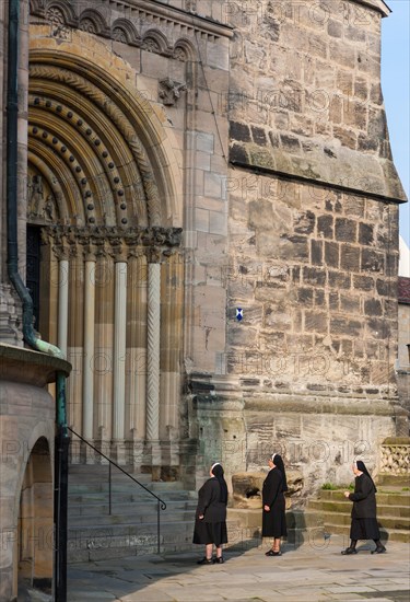 Nuns standing in front of Bamberg Cathedral