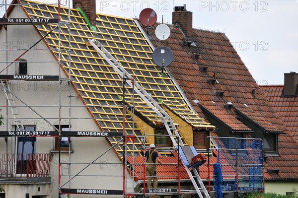 Roofing of one half of a double house from the 1950s