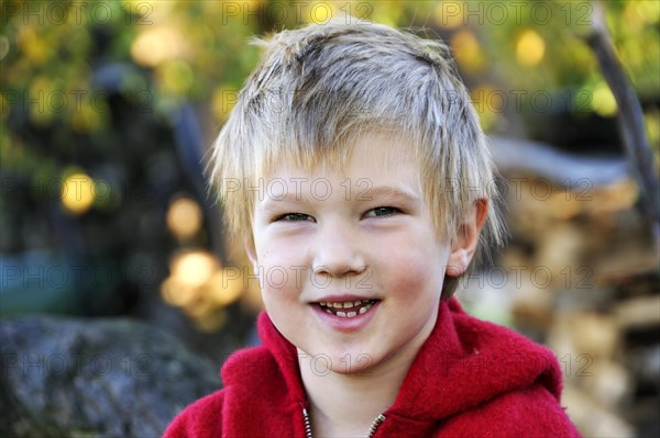 Portrait of a blond boy smiling