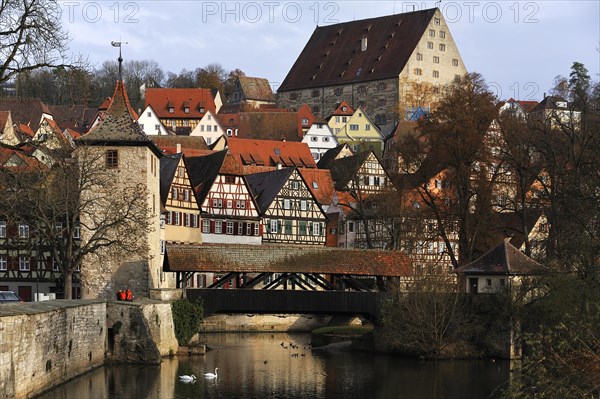 Overlooking the historic town centre of Schwäbisch Hall with Sulferturm tower and the Sulfersteg covered wooden footbridge crossing the Kocher River