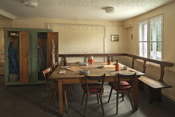 Table and locker in the dining room of an industrial company in the 1950s