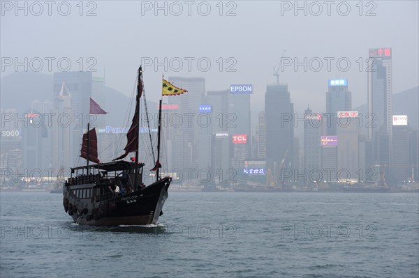 View of a boat in the bay of Victoria Harbour and Hong Kong Island
