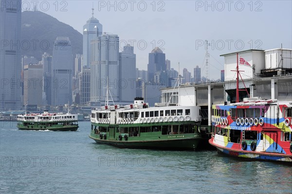 Ferry in the Bay of Victoria Harbour and Hong Kong Island