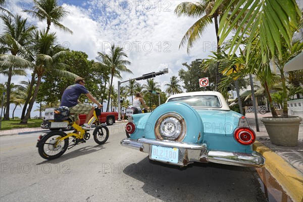 Couple riding electric bicycles