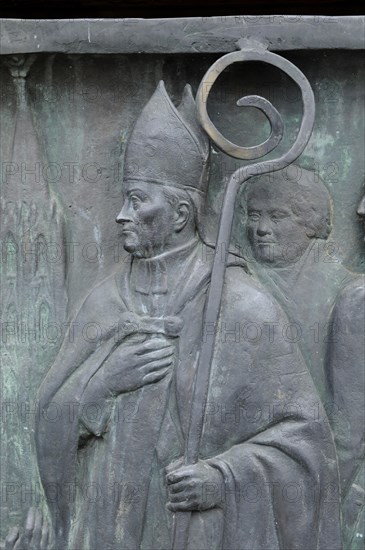 Relief of a bishop on the equestrian monument in Heumarkt square
