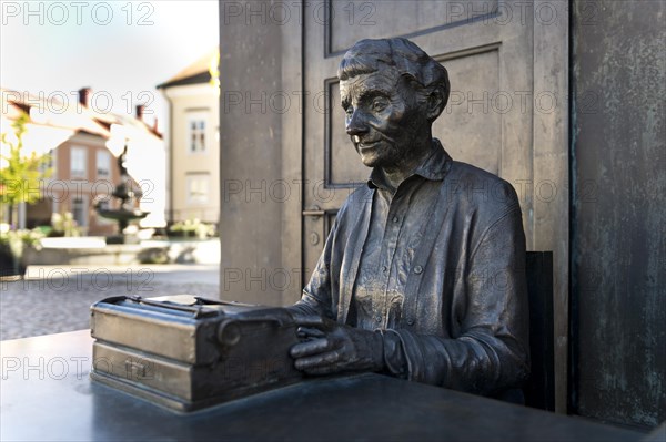 The children's book author Astrid Lindgren in her office at her typewriter