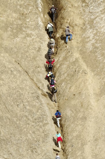 People climbing inside Viti Crater