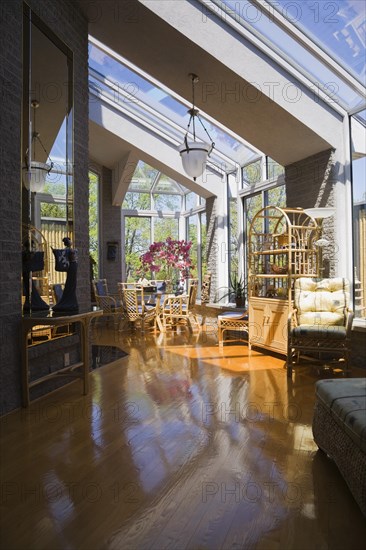 Wicker furniture in an opened concept living room of a modern residential home