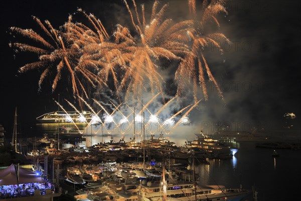 Fireworks over Port Hercule with yachts and cruise ship