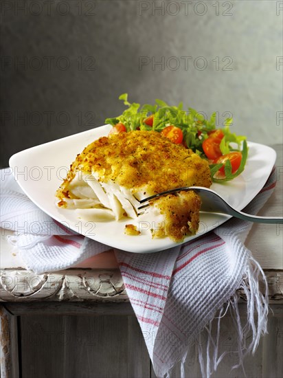 Lightly battered cod and salad