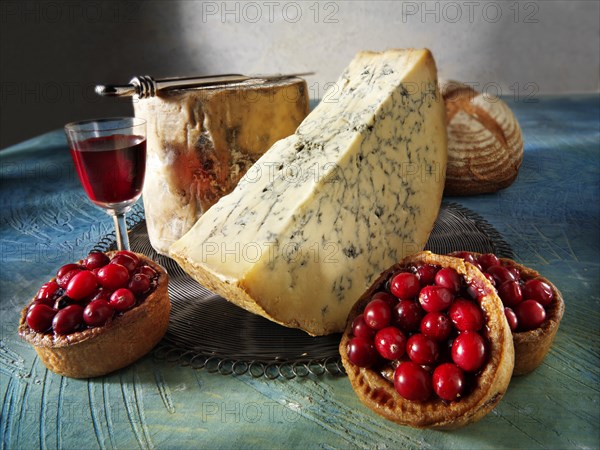 Traditional blue Stilton cheese with cranberry pork pie