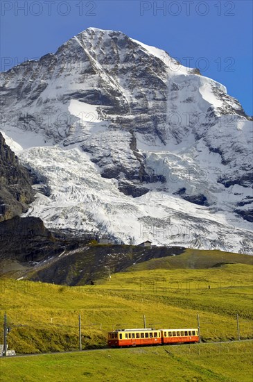 Junfraujoch funicular railway in front of the Moench from Kleine Scheidegg