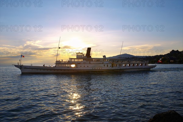 Ferry at sunset on Lac Leman