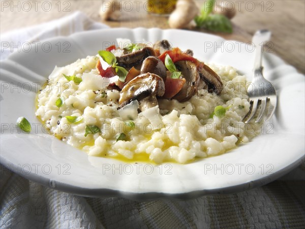 Classic risotto with wild porcini mushrooms and bacon