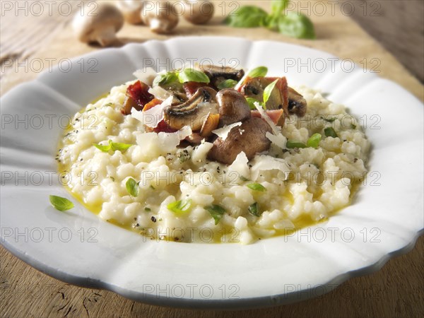 Classic risotto with wild porcini mushrooms and bacon