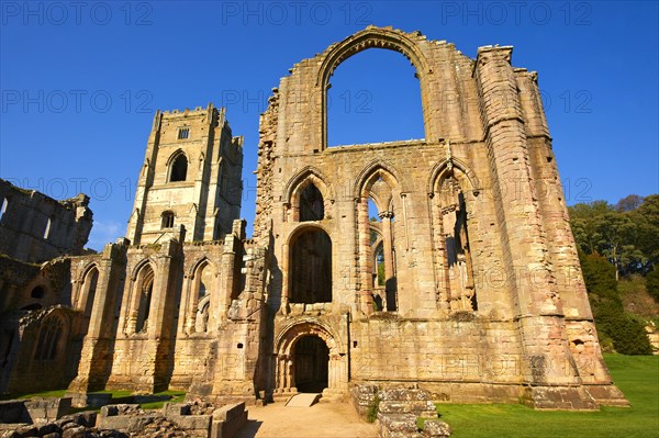 Side chapel wall and bell tower of Fountains Abbey