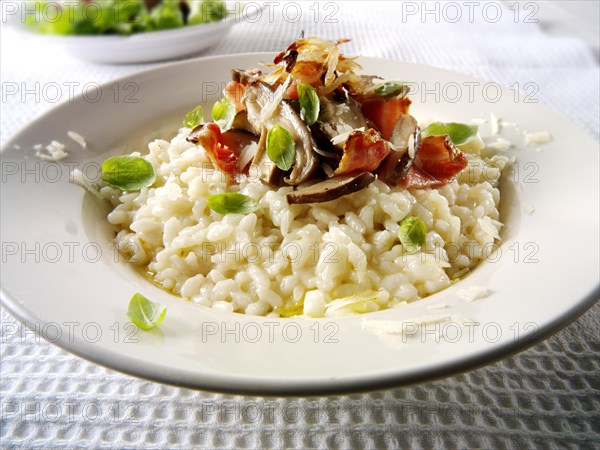 Classic risotto with wild porcini mushrooms and bacon