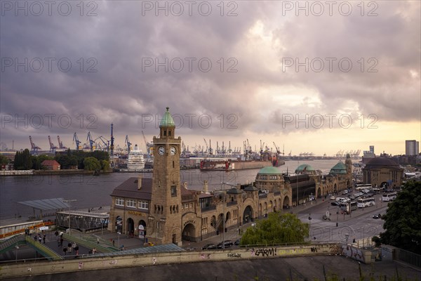 St. Pauli Landungsbrucken jetties with level tower and Blohm + Voss shipyard in Hamburg